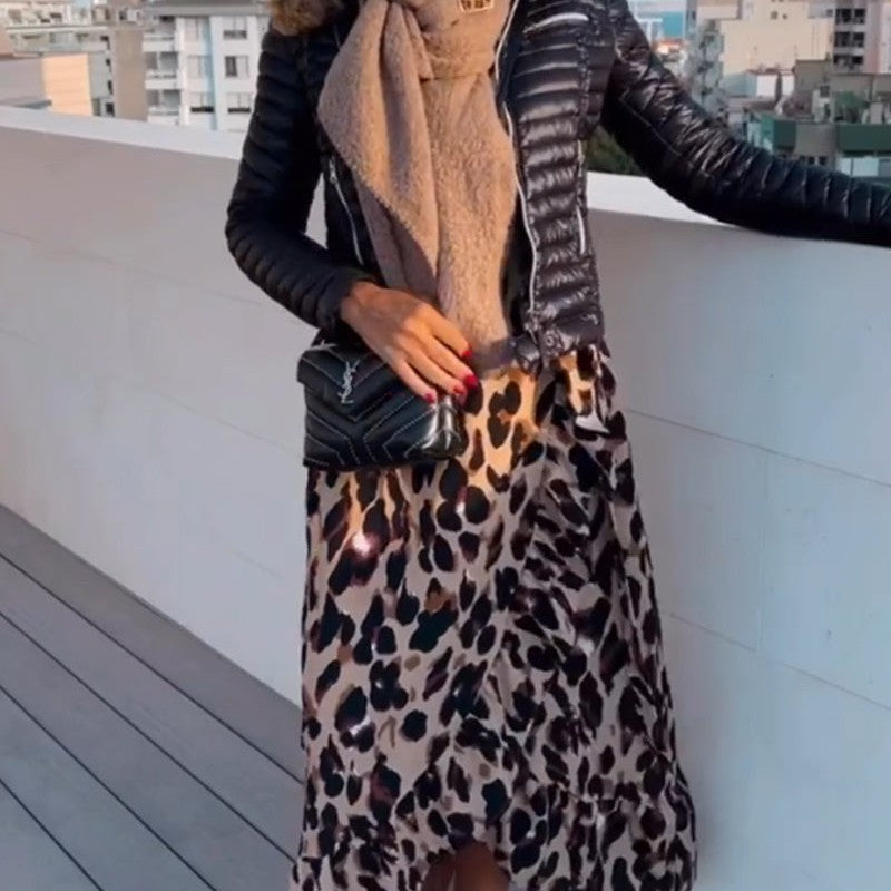 Leopard print dress with V-neckline.